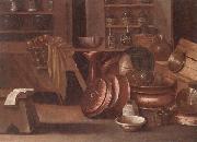 A Kitchen still life of utensils and fruit in a basket,shelves with wine caskets beyond unknow artist